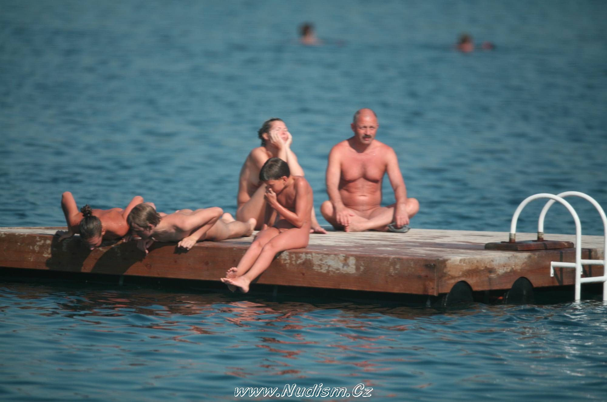 [Image: Naturist-Family-Water-Slab-Pure-Nudism-Images-2.jpg]