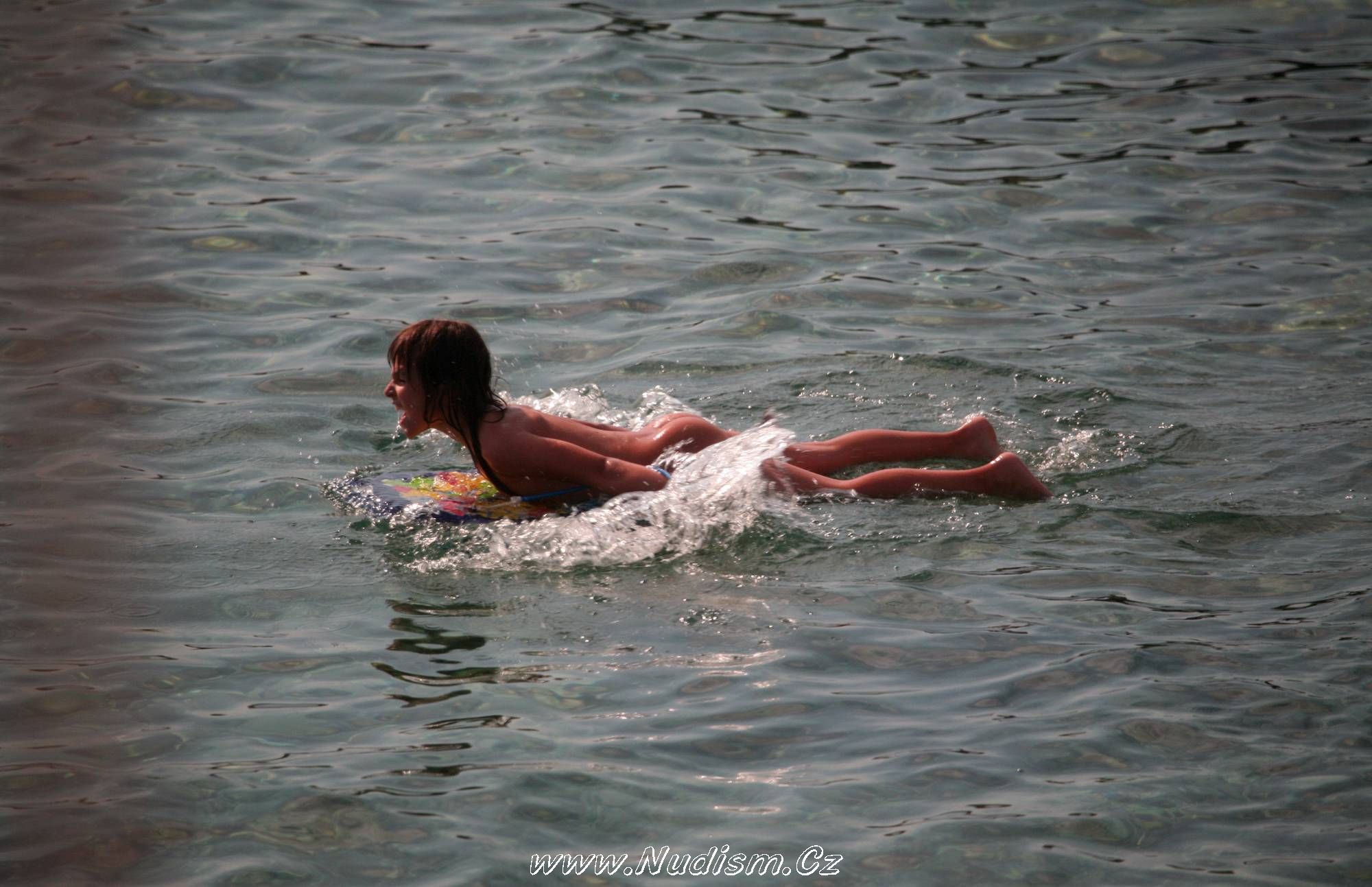 [Image: Naturist-Surf-Board-Glides-Pure-Nudism-Pics-2.jpg]