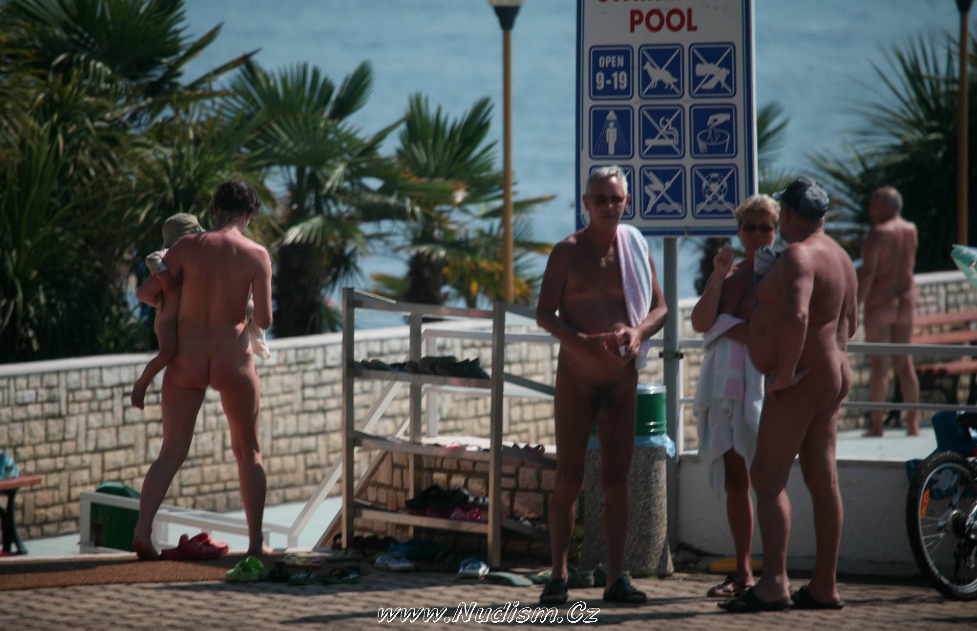 [Image: Pure-Nudism-Gallery-Pool-Outskirt-Nude-Guests-1.jpg]