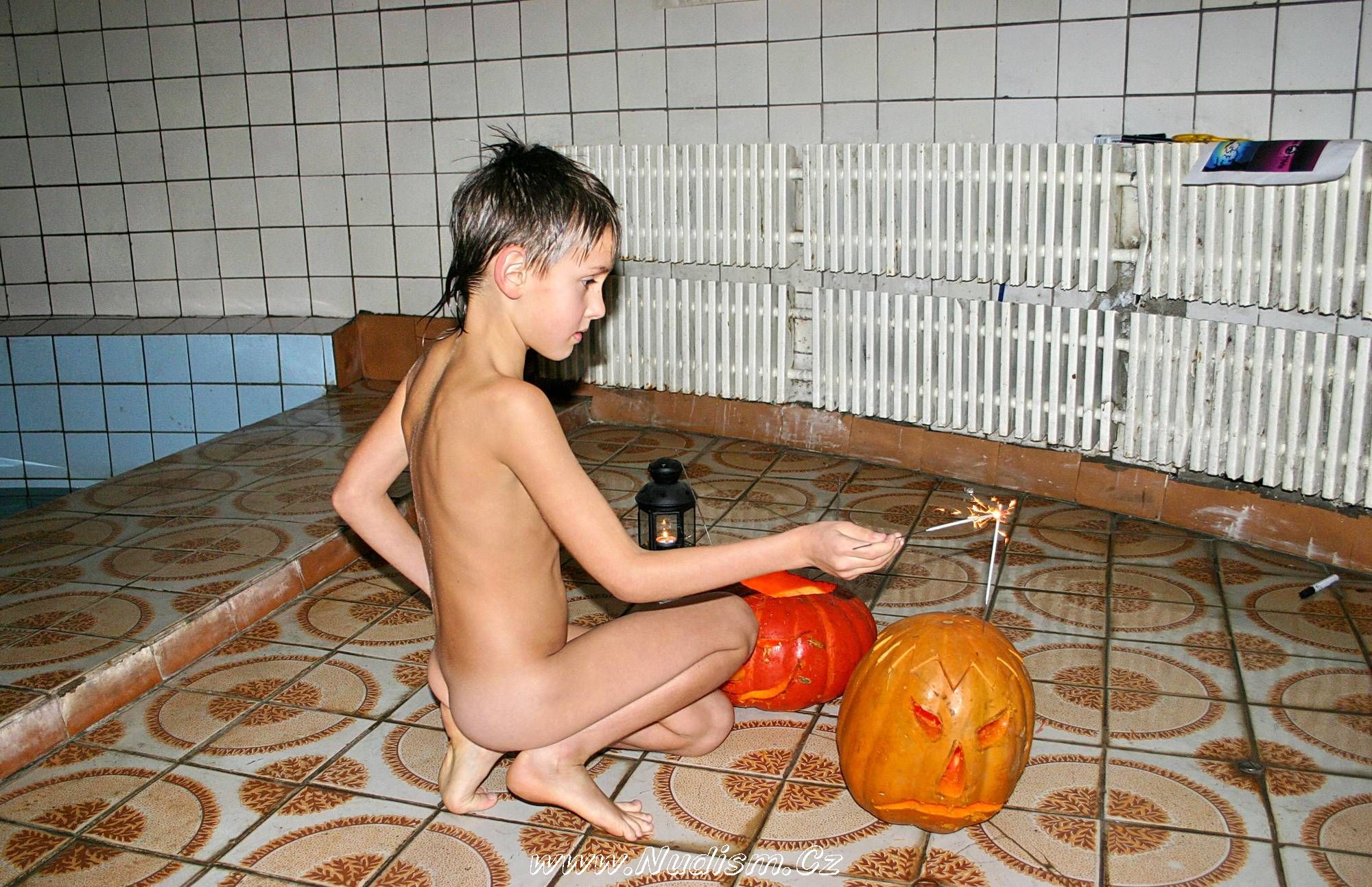 [Image: Pure-Nudism-Photos-Halloween-Boys-Pumpkin-3.jpg]