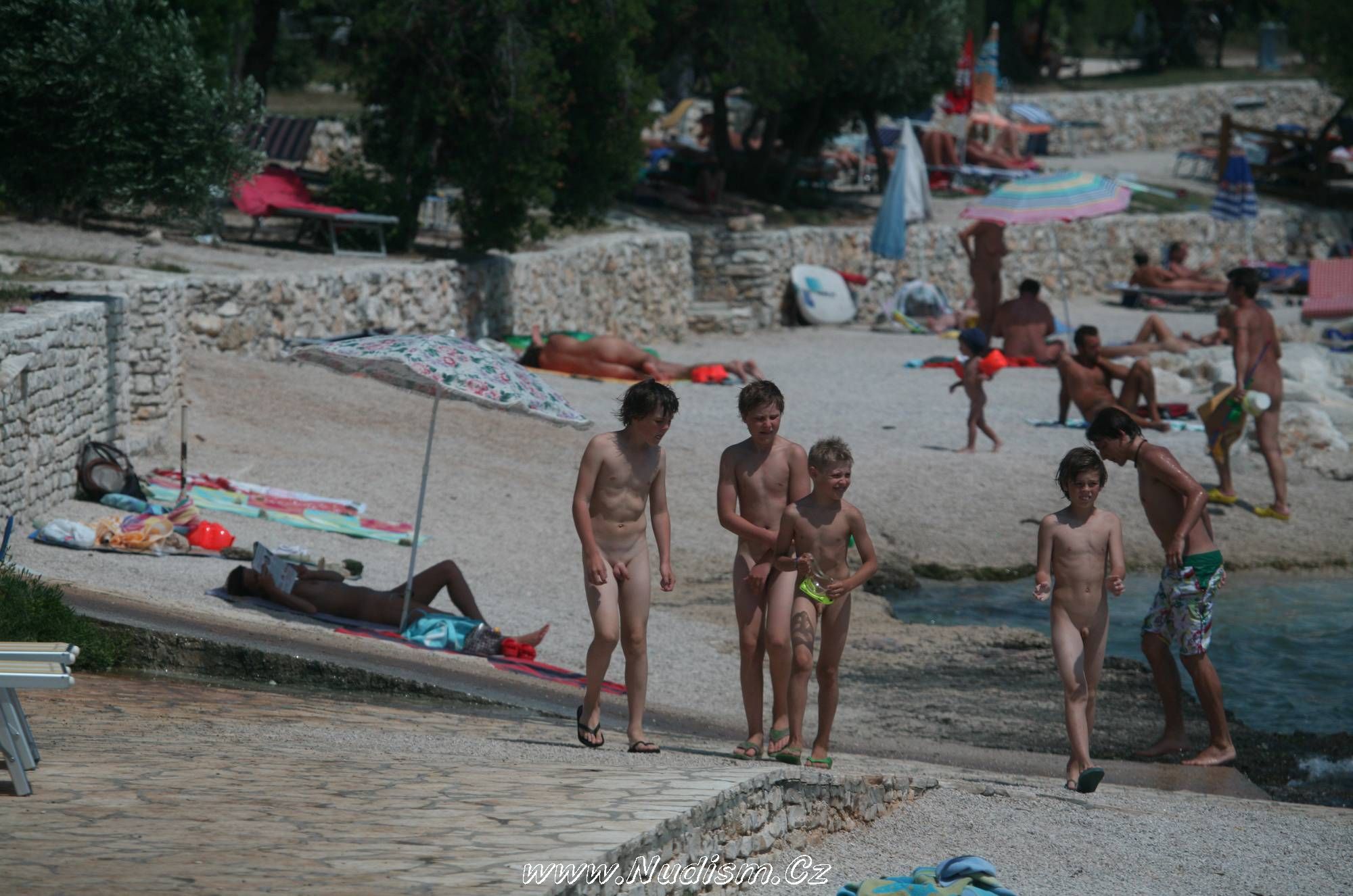 [Image: Purenudism-Boy-Nudist-Shore-Walking-1.jpg]